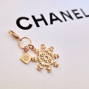 CHANEL New Gold CC Snowflake + mini cc square Charms on Lobster Clasp.